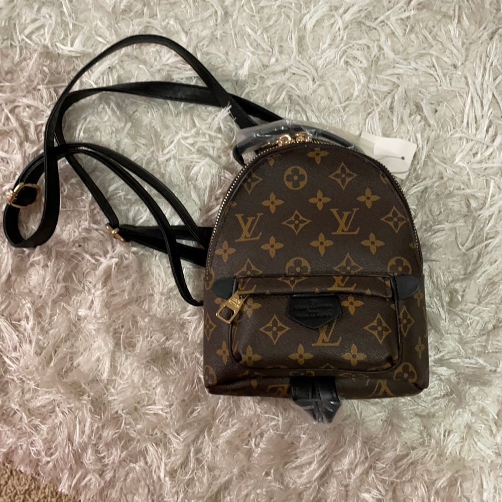 Mini brown backbag. Brand new